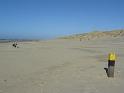 229 voorbij deze gele paal het strand af